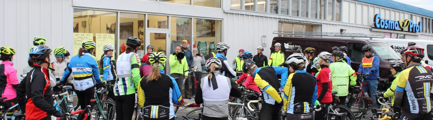Group of cyclists gathered with bikes image