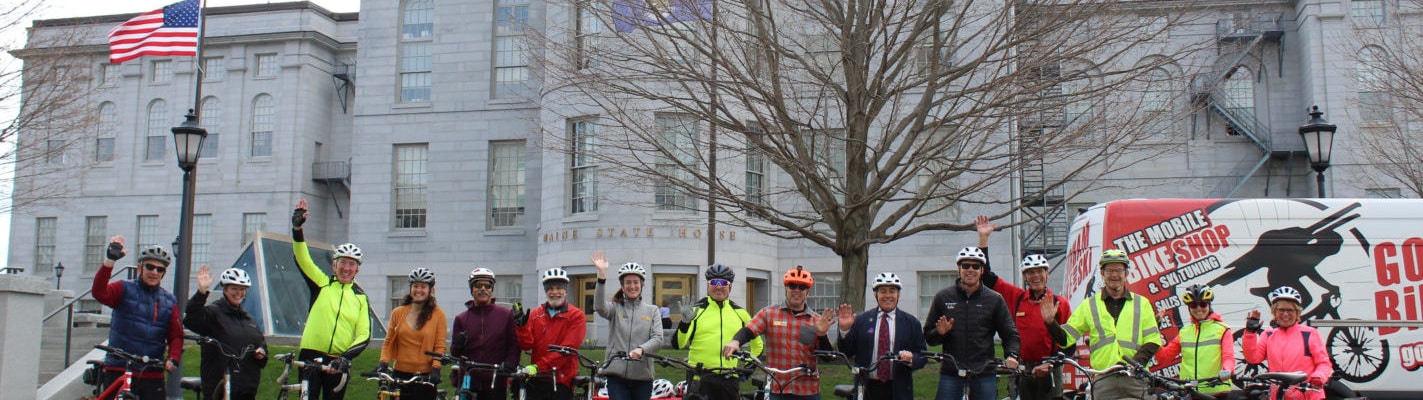 People with bikes outside Maine capitol in Augusta image